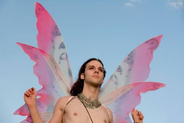 Faerie festival entertainment surrounded by bright woodland scenery